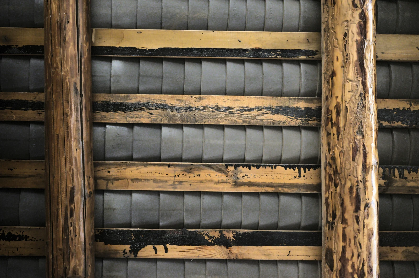 brown wooden frame with blue and white striped textile